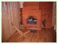Room with fireplace in the summer house